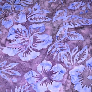 May include: Purple fabric with a blue floral pattern. The pattern features hibiscus flowers and leaves.