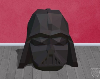 May include: A black, geometric Darth Vader helmet sculpture. The artwork is a low-poly design, with a detailed representation of the iconic helmet. The background features a red wall and a wooden floor.