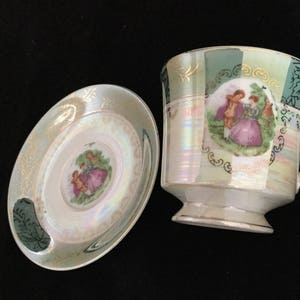 Teacup/Coffee Cup and Saucer Japan Lusterware Fragonard Courting Couple