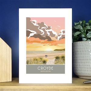 Puesta de sol en la playa de Croyde, North Devon. Tarjeta de felicitación tamaño A6 con retrato. Más de 500 para elegir.