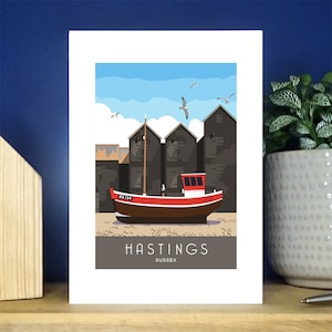Cabañas de Hastings, barcos de pesca rojos, Hastings. Tarjeta de felicitación vertical A6. Más de 500 para elegir.