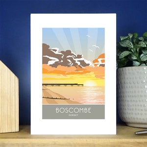 Molo di Boscombe, Biglietto d'auguri, Alba, Dorset. Biglietto d'auguri verticale A6. Oltre 500 tra cui scegliere.