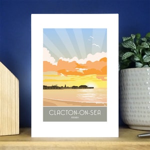 Clacton op Sea Pier Sunrise portret wenskaart. Keuze uit meer dan 500.
