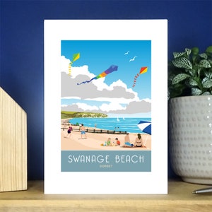 Cometas en la playa de Swanage, sureste de Dorset. Tarjeta de felicitación vertical A6.