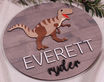 T-Rex Nursery nome segno, Boy Dinosaur Decor, Dinosaur Room Sign, baby name wall art, nome personalizzato, nursery segno rotondo, segno del nome del legno