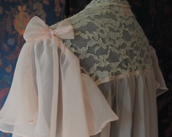 Or small undressed babydoll pink 1960