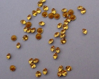 50 Topaz Chatons demi-fins PP14