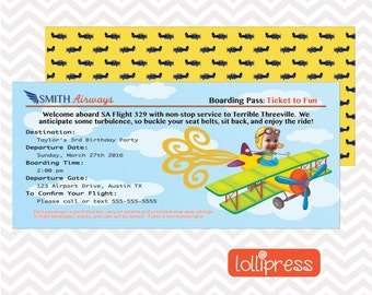 May include: A blue and yellow airplane party invitation with a photo of a child in a pilot's hat. The invitation says "Welcome aboard SA Flight 329 with non-stop service to Terrible Threeville. We anticipate some turbulence, so buckle your seat belts, sit back, and enjoy the ride!" and includes details about the party, such as the date, time, and location.