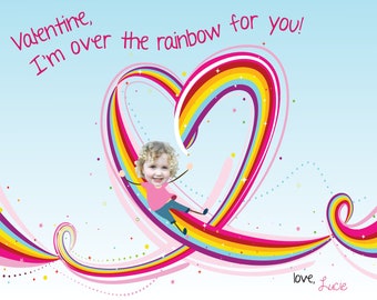 May include: A Valentine's Day card with a rainbow heart design. The text on the card reads "Valentine, I'm over the rainbow for you! love, Lucie".
