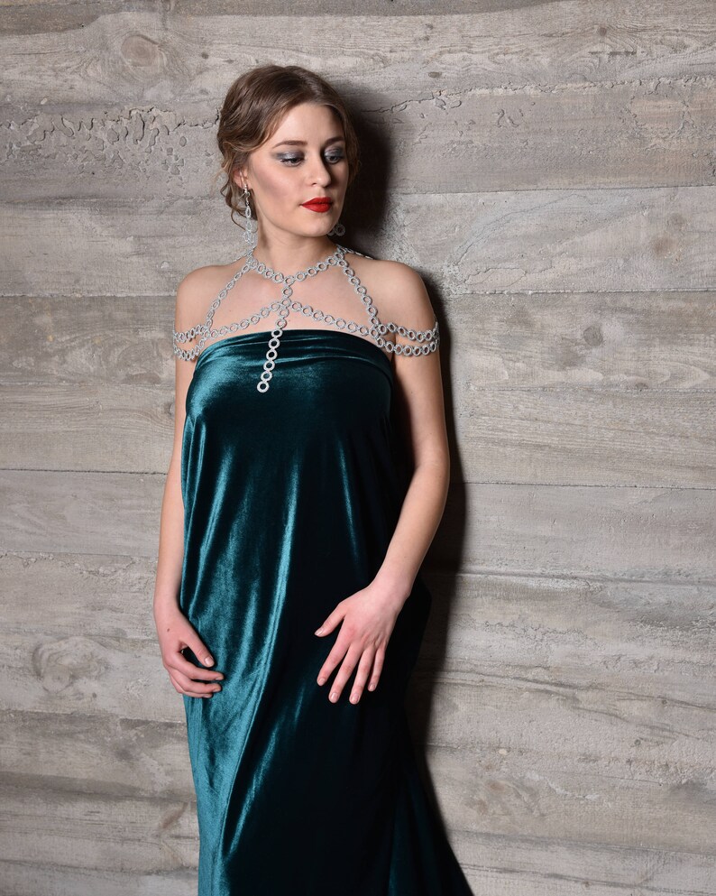 Silver color shoulder jewelry and earrings are great festive outfit for ladies