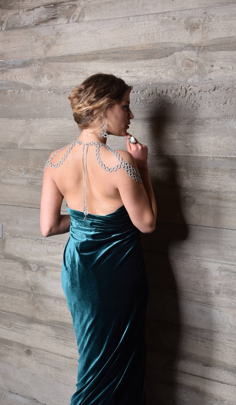 Silver color shoulder jewelry and earrings are great festive outfit for ladies