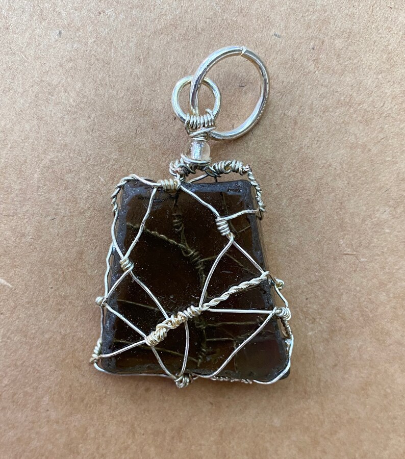 Silver wire wrapped sea glass pendant