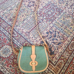 Vintage Dooney and Bourke All Weather Leather Green Tan Pebbled Equestrian Crossbody Shoulder Bag