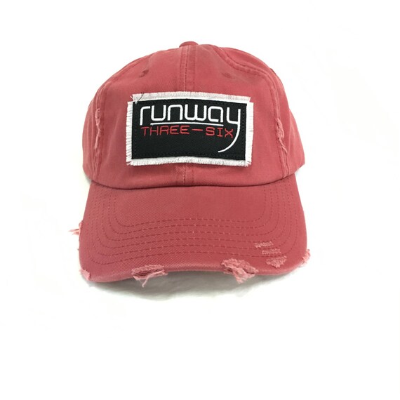 faded red baseball cap