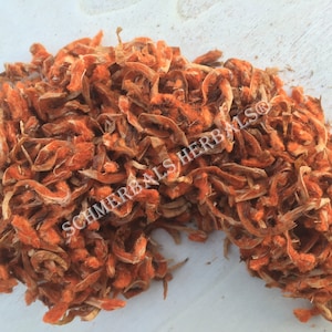 Op de afbeelding: Gedroogde sinaasappelbloesemblaadjes, een natuurlijk ingrediënt voor kruidenthee en remedies. De blaadjes zijn fel oranje van kleur en hebben een licht pluche textuur.  SCHMERBALS HERBALS®
