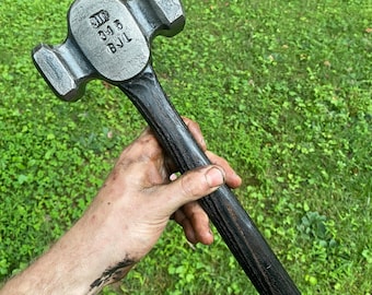 Hand forged 3.5 pound rounding hammer.