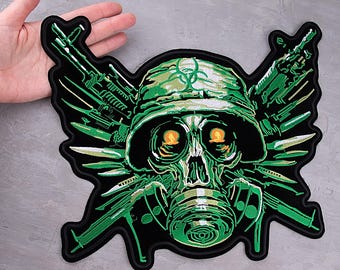 May include: A black patch featuring a green skull wearing a military helmet and gas mask. The skull has glowing orange eyes. Green rifles and knives are arranged around the skull. The patch has the word "PATCHFUL" at the bottom.