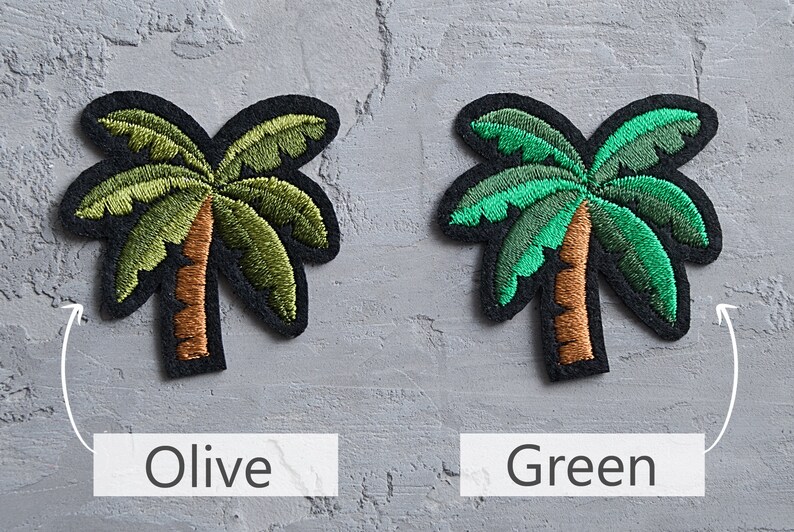 May include: Two embroidered palm tree patches, one in olive green and one in bright green. The patches are on a gray background.