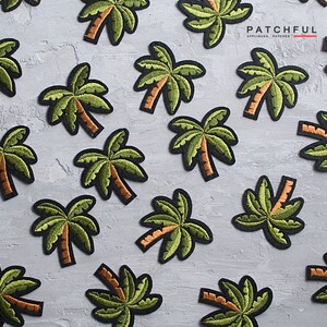 May include: A collection of green and brown embroidered palm tree patches. The patches are arranged on a gray textured surface. The text "PATCHFUL" is visible in the upper right corner of the image.