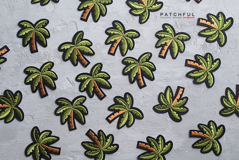 May include: A collection of green and brown embroidered palm tree patches. The patches are arranged on a gray textured surface. The text "PATCHFUL" is visible in the upper right corner of the image.