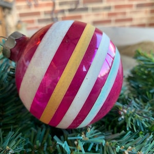 Vintage 2 3/4&quot;  UNSILVERED Dark Pink Colored with Hand Painted White, Aqua, Yellow Stripes Glass Christmas Ornament, 1940&#39;s WWII Wartime Era