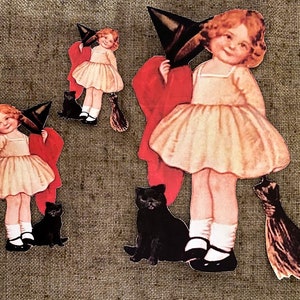 Fille de style des années 1900, chapeau de sorcière et chat, décoration d'Halloween en papier cartonné découpé à la main, encadrement artisanal, décoration de cupcakes