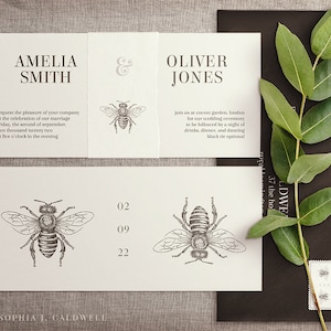 May include: A wedding invitation featuring a black and white bee illustration. The invitation is for Amelia Smith and Oliver Jones. The text reads "request the pleasure of your company at the celebration of our marriage Friday, the second of September, two thousand twenty two at five o'clock in the evening." and "join us at Covent Garden, London for our wedding ceremony to be followed by a night of drinks, dinner, and dancing black tie optional."