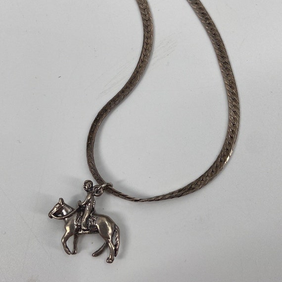 Sterling Silver man riding a horse necklace - image 1