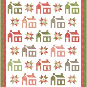 May include: A patchwork quilt featuring a repeating pattern of houses and starbursts in shades of red, green, and gray on a white background. The quilt has a red and green floral border.