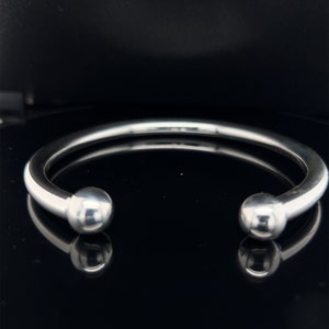 Heavy Oval Torque Sterling Silver Bangle.