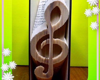 Patrón de cuaderno de notas musicales plegable con clave de sol en formato PDF