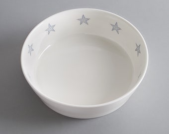 Bone china dog bowl with little blue stars. Free P&P