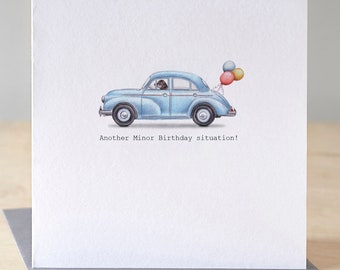 Funny birthday card with a dog driving a blue Morris Minor. Funny dog birthday card. Morris Minor car