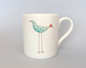 Bone china mug with blue quirky bird. Free P&P