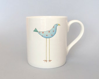 Bone china mug with blue quirky bird. Free P&P