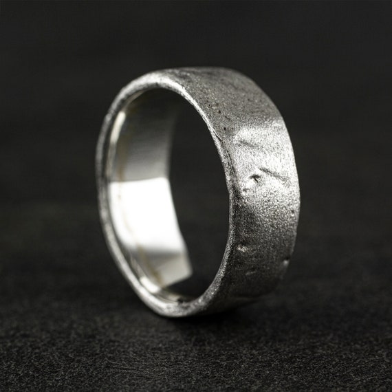 ROUGH sterling ring with a destroyed pattern. Diamond texture.