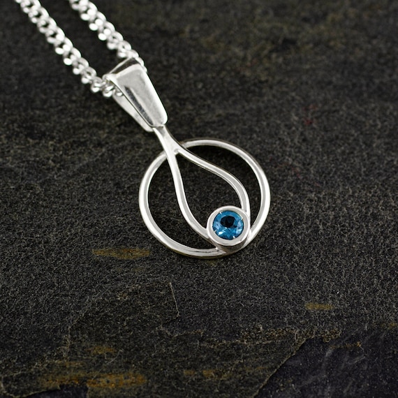 FLAMA Pendant 925 Sterling Silver with faceted London Blue Topaz. Silver chain 45 cm.
