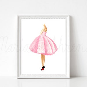 Pink dress watercolor fashion illustration displayed in white picture frame on a white background. Original artwork is by artist Maria Ahrens.