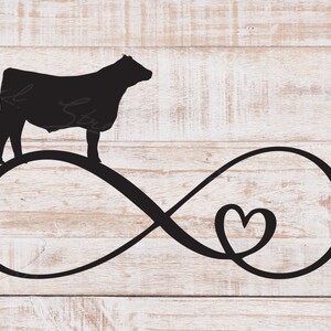 May include: Black silhouette of a cow standing above an infinity symbol with a heart. The design is set against a light wood-grain background. A rustic, country-themed decorative item.