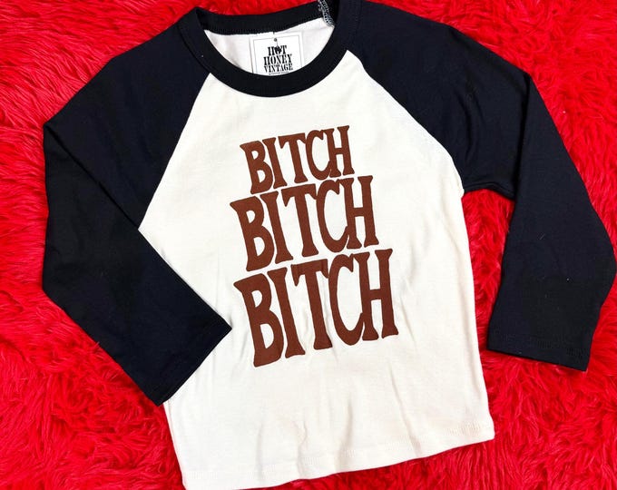 3/4 Sleeve Raglan Ribbed Baby Tee With Vintage Inspired Bitch Graphic