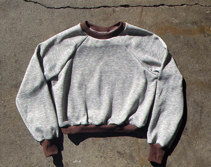 The “Wild Rider” Blank Cropped Raglan Sweatshirt