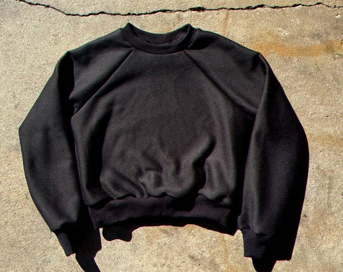 The “Wild Rider” Blank Cropped Raglan Sweatshirt
