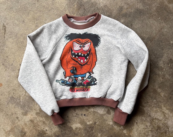 The “Sure I Raise Hell” Gray Cropped Raglan Sweatshirt