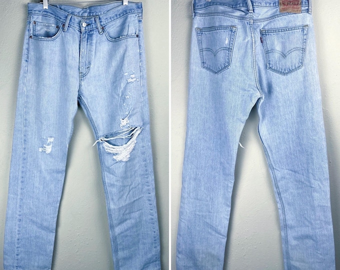 Y2K Lightwash Levi’s 505 Distressed Denim Waist 34”