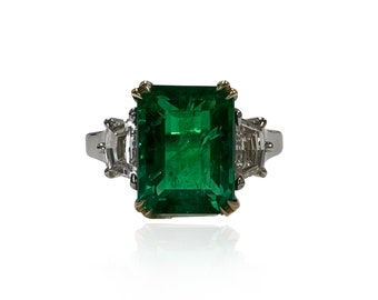 3.27 CTS Emerald Three Stone Ring , 18k yellow Gold Basket