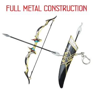 May include: A gold and black bow and arrow keychain with a quiver. The bow and arrow are made of metal and have intricate details. The quiver is black with gold accents and has a strap for attaching to a belt.