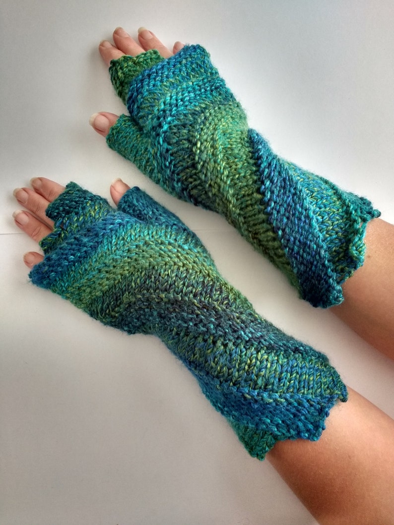 Hand knitted spiral fingerless gloves by Angela Gardner Studio Teal