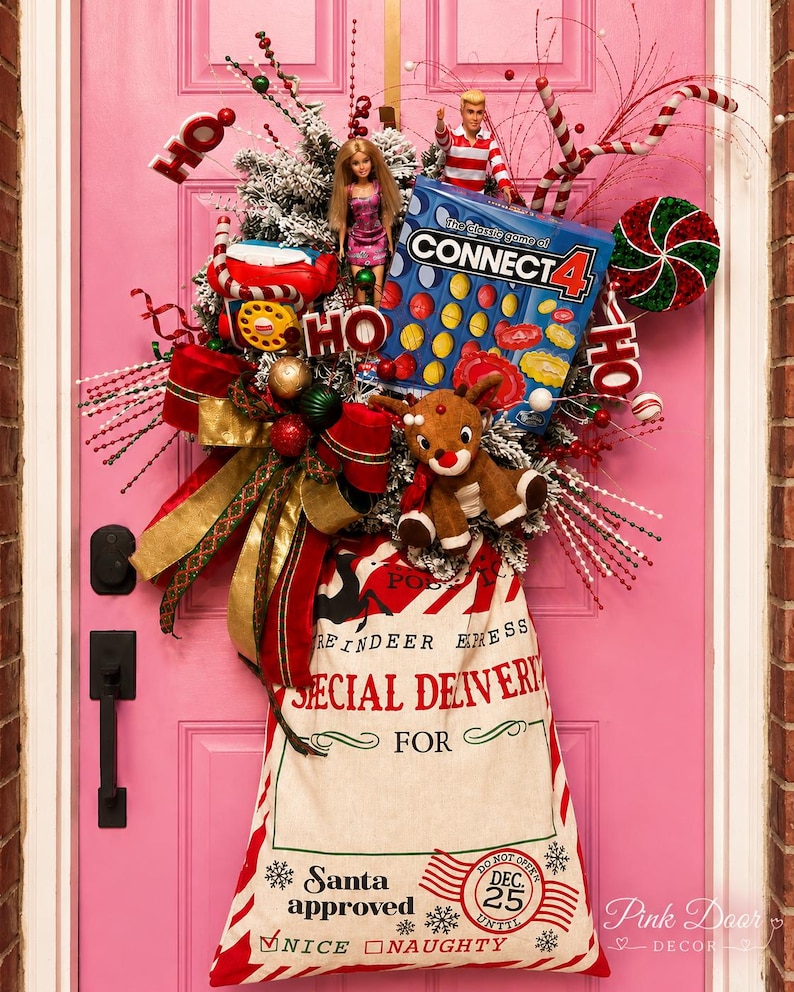 Santa Sack Wreath — oversized retro Christmas door swag with a Special Delivery Reindeer Express sack, vintage toys, plush reindeer, ornaments, and candy canes