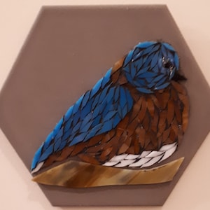 Ostblaues Vogelmosaik auf Sechseckfliese