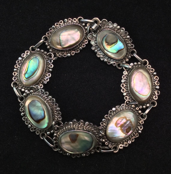 Preowned Sterling Silver Mexico Oval Abalone Scrol